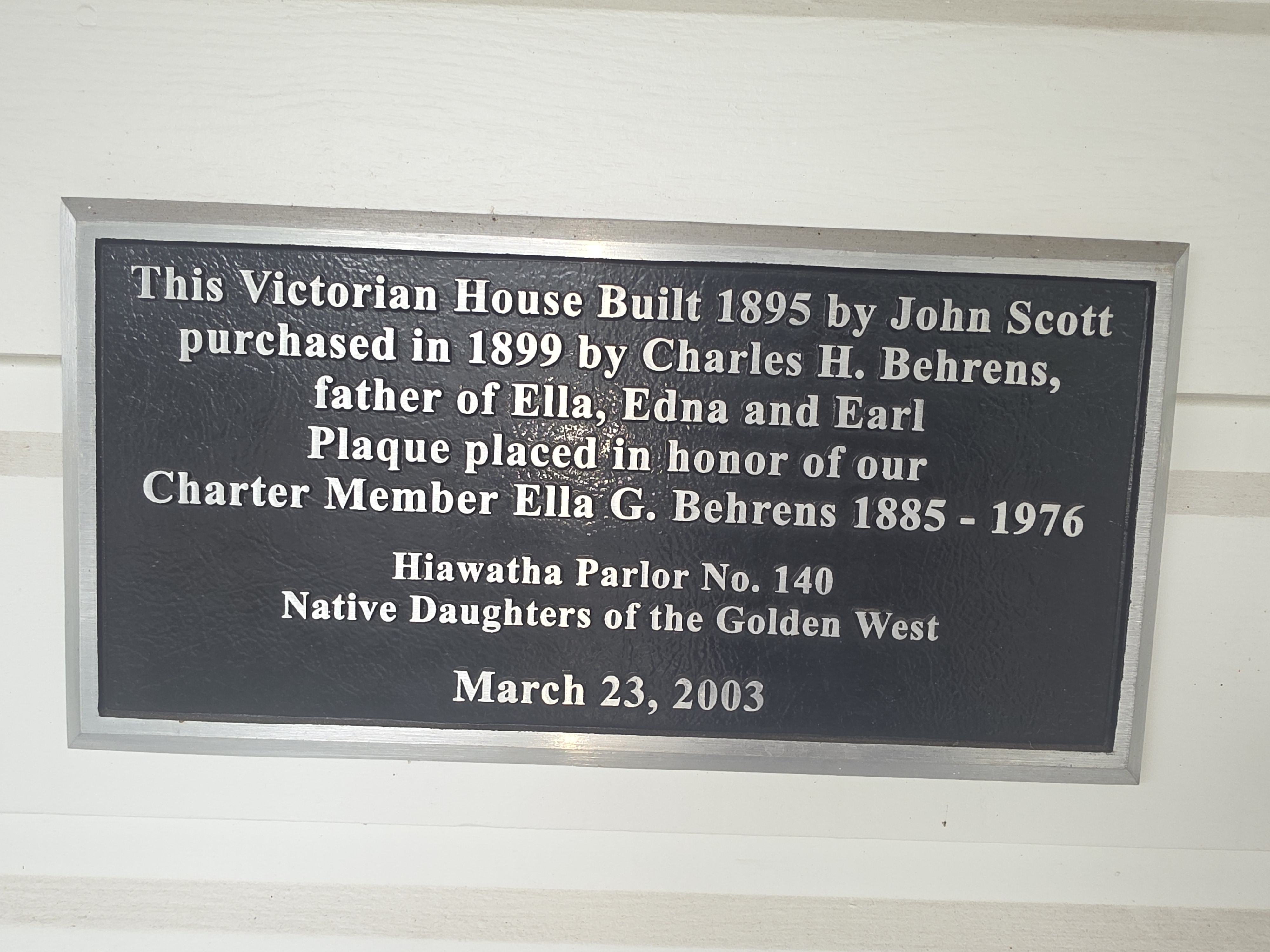 Plaque describing the history of the house.